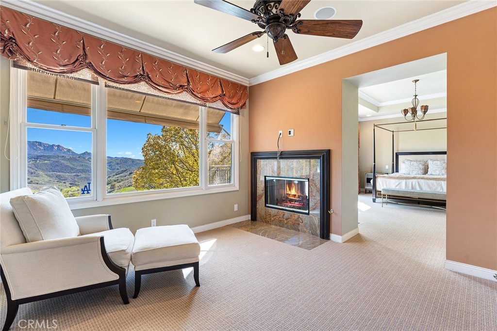 24920 Pso Del Rancho Calabasas, CA 91302 - Photo 39 of 58 Primary Suite Sitting Room with Fireplace