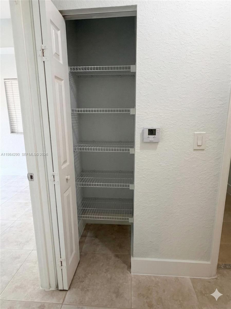2801 Riverside Drive, Unit 204 Coral Springs, FL 33065 - Photo 14 of 20 a view of closet area