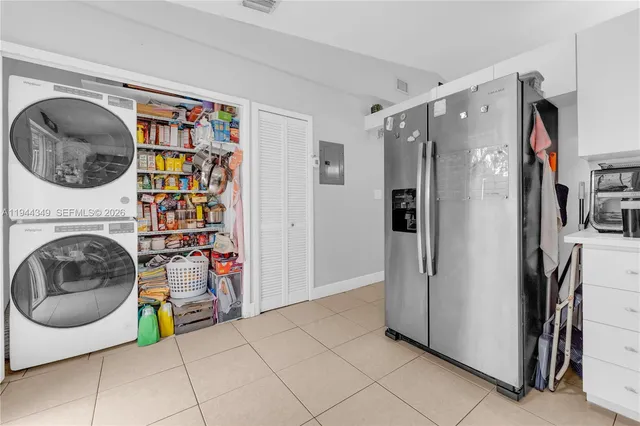 a view of a storage & utility room with washer and dryer