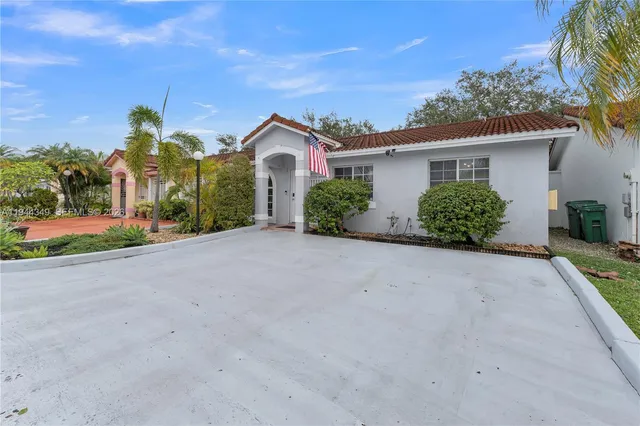 front view of a house with a street
