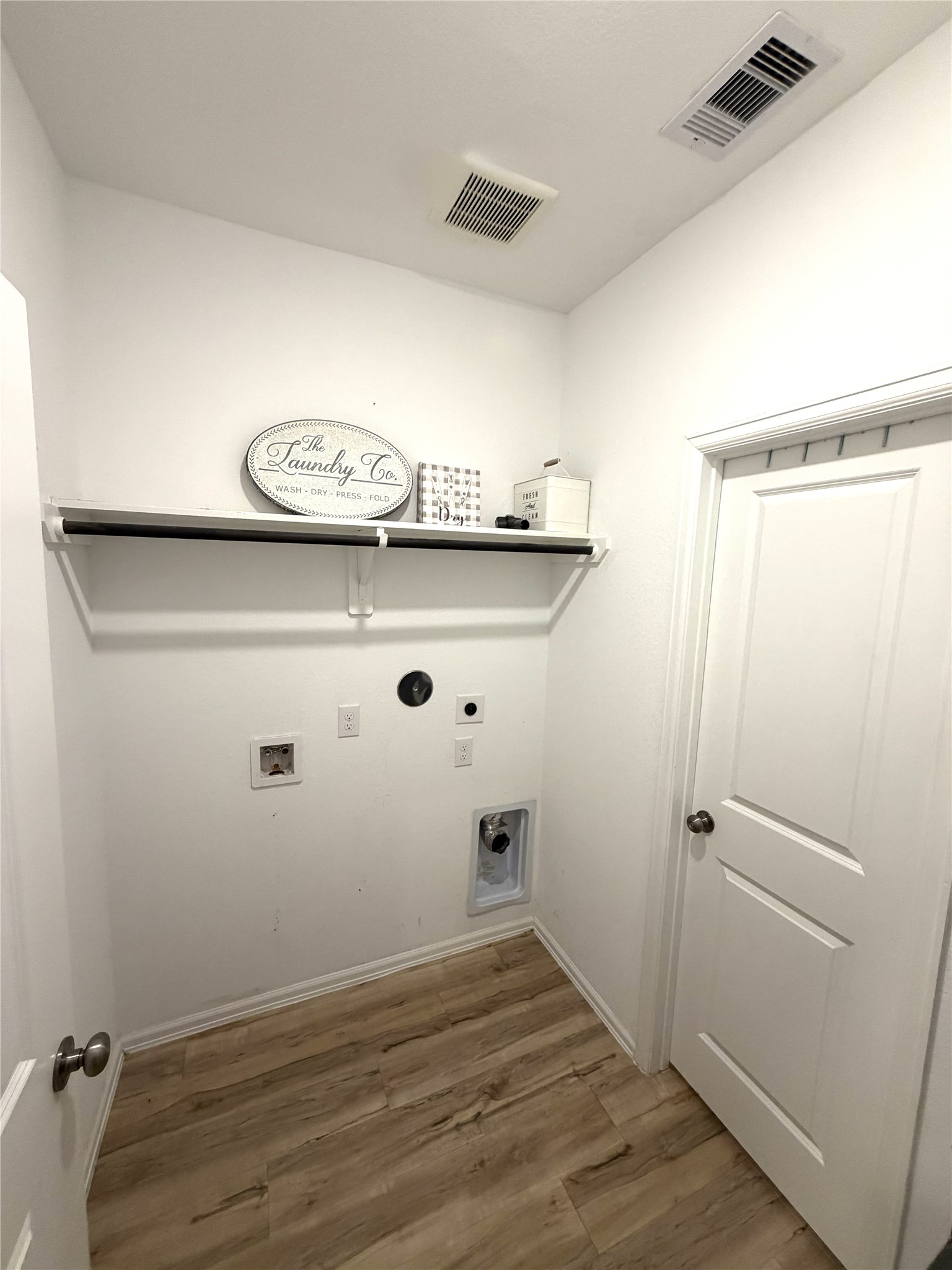 5323 Winding Strm Drive Rosenberg, TX 77469 - Photo 13 of 13 a view of a closet with wooden floor