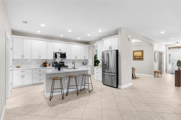 $590,000 | 7938 Hampton Lake Drive, Tampa, FL 33647