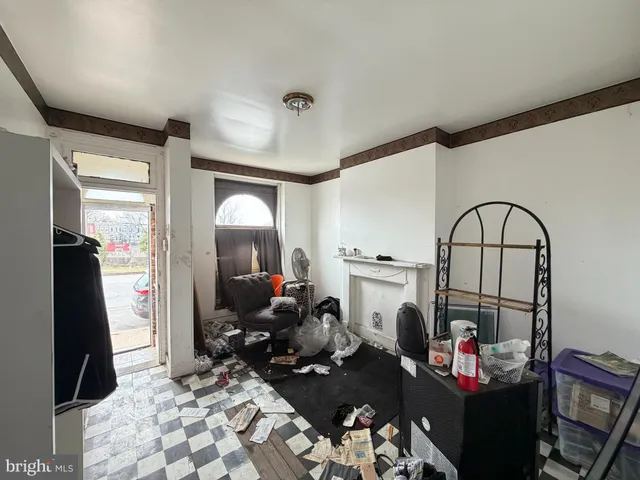 a living room with fireplace furniture and a flat screen tv