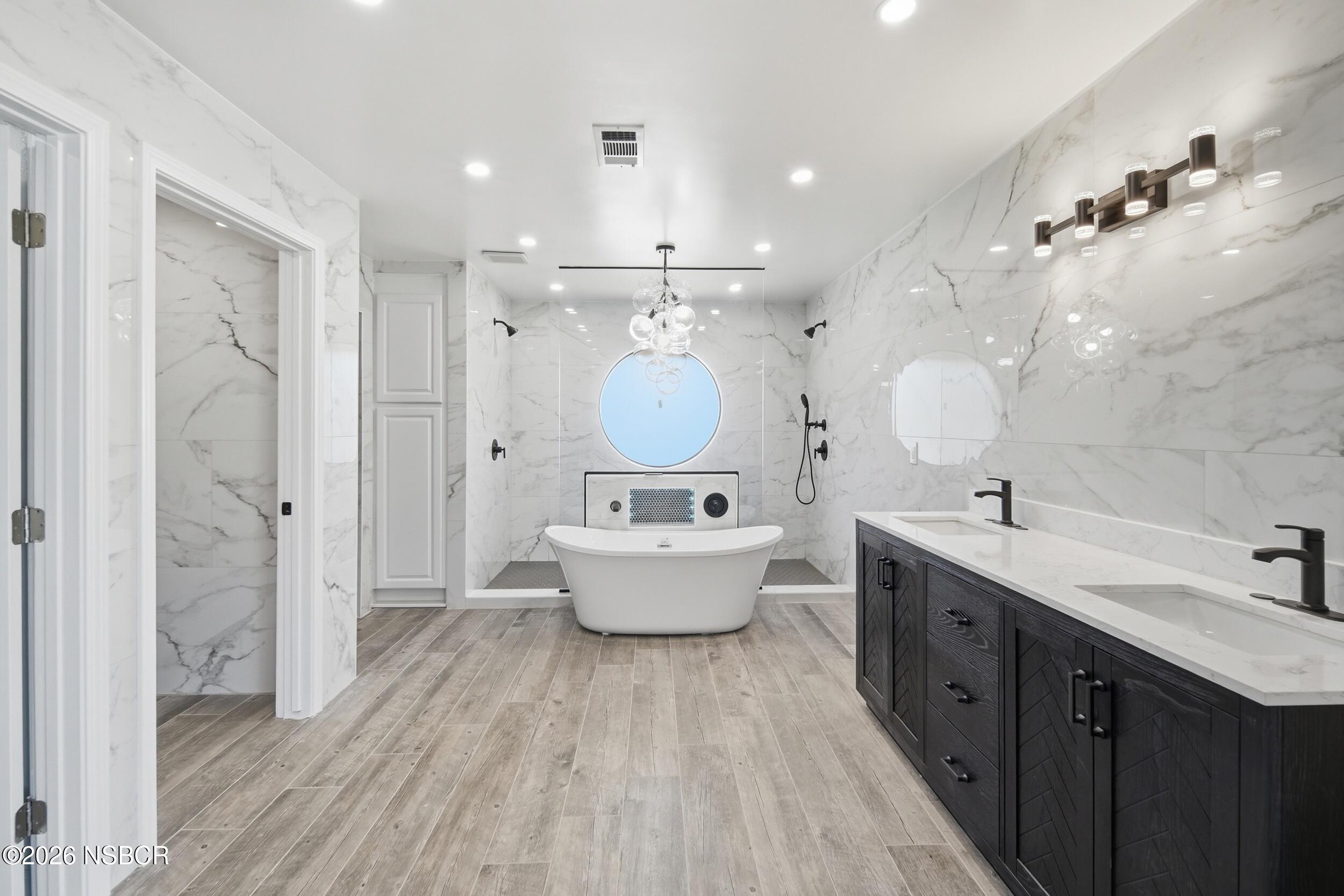 140 East Rice Ranch Road Santa Maria, CA 93455 - Photo 29 of 44 a bathroom with a bathtub shower sink mirror and toilet