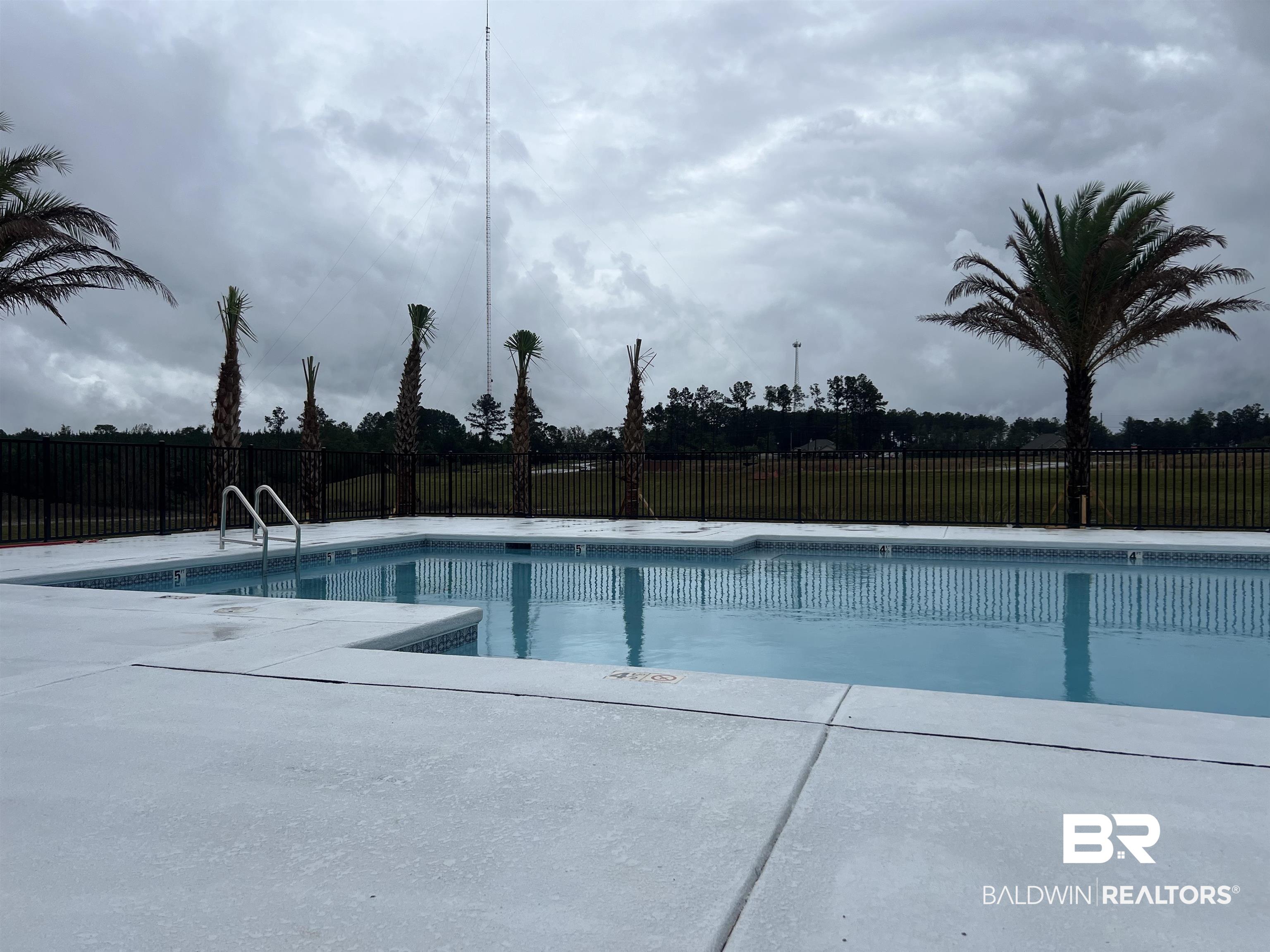 12829 Patriot Way Daphne, AL 36527 - Photo 35 of 38 View of swimming pool with a patio area
