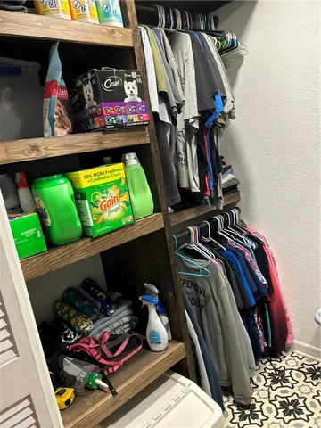 a close view of sink and washer dryer