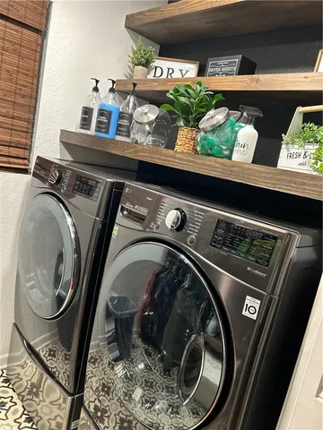 a view of a livingroom with furniture and windows