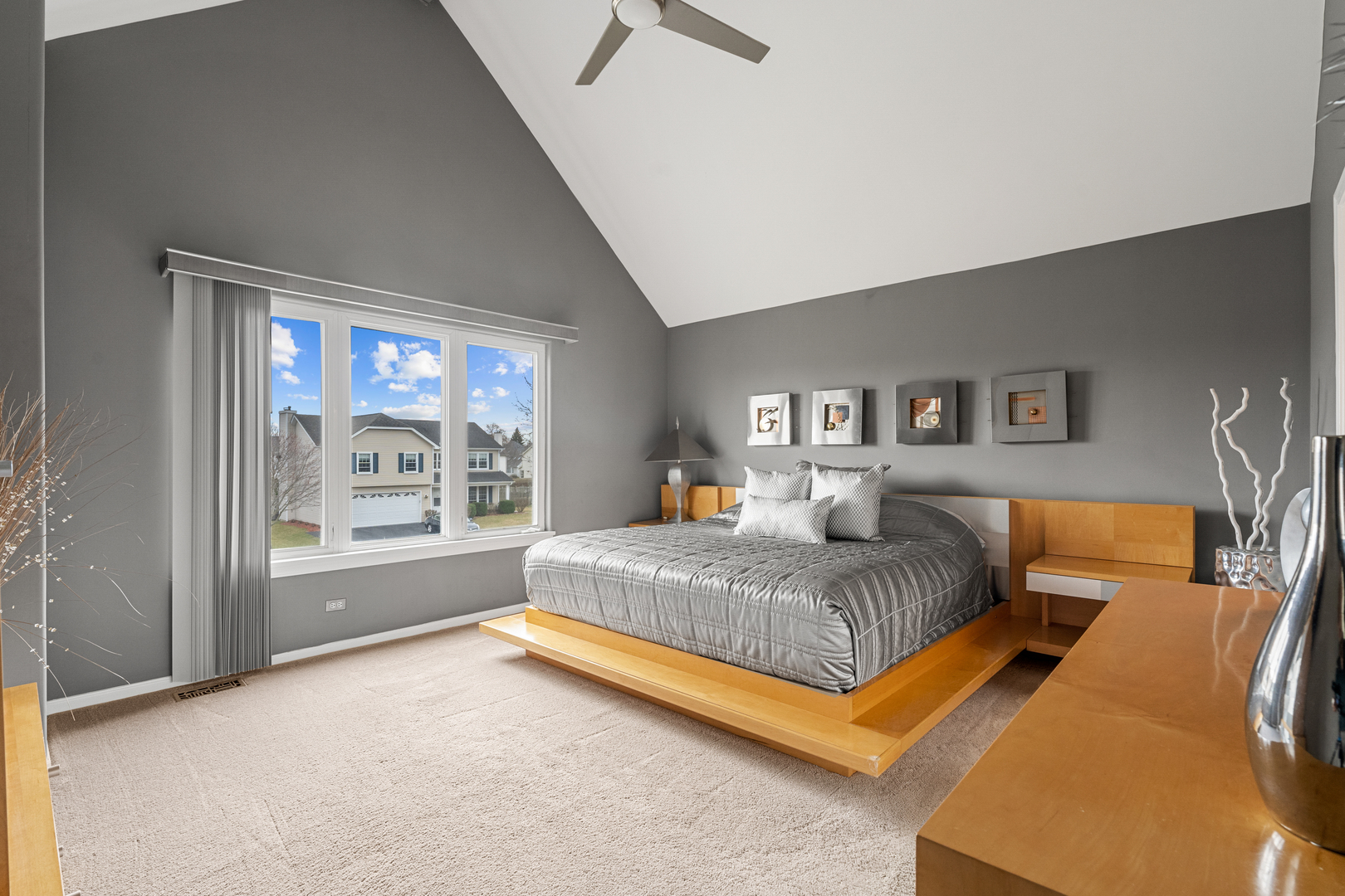 24962 Ambrose Road Plainfield, IL 60585 - Photo 21 of 28 a bedroom with a large bed and a window