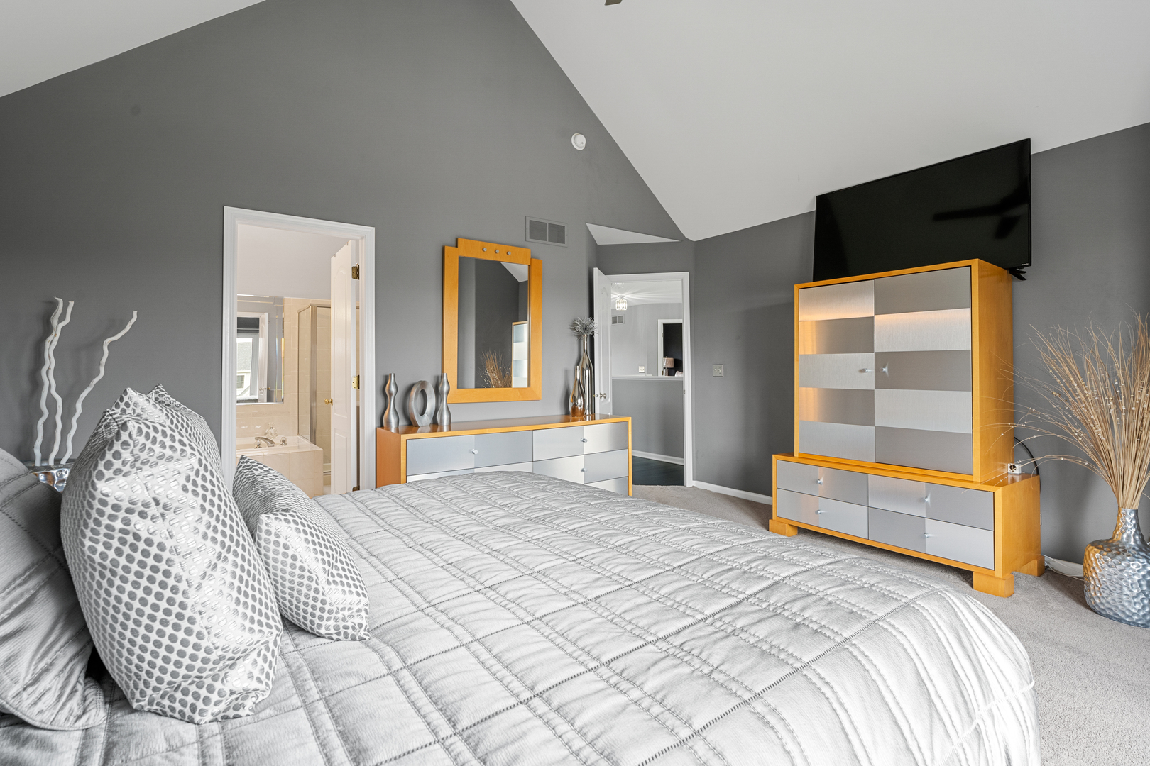 24962 Ambrose Road Plainfield, IL 60585 - Photo 22 of 28 a bedroom with a bed and glass door