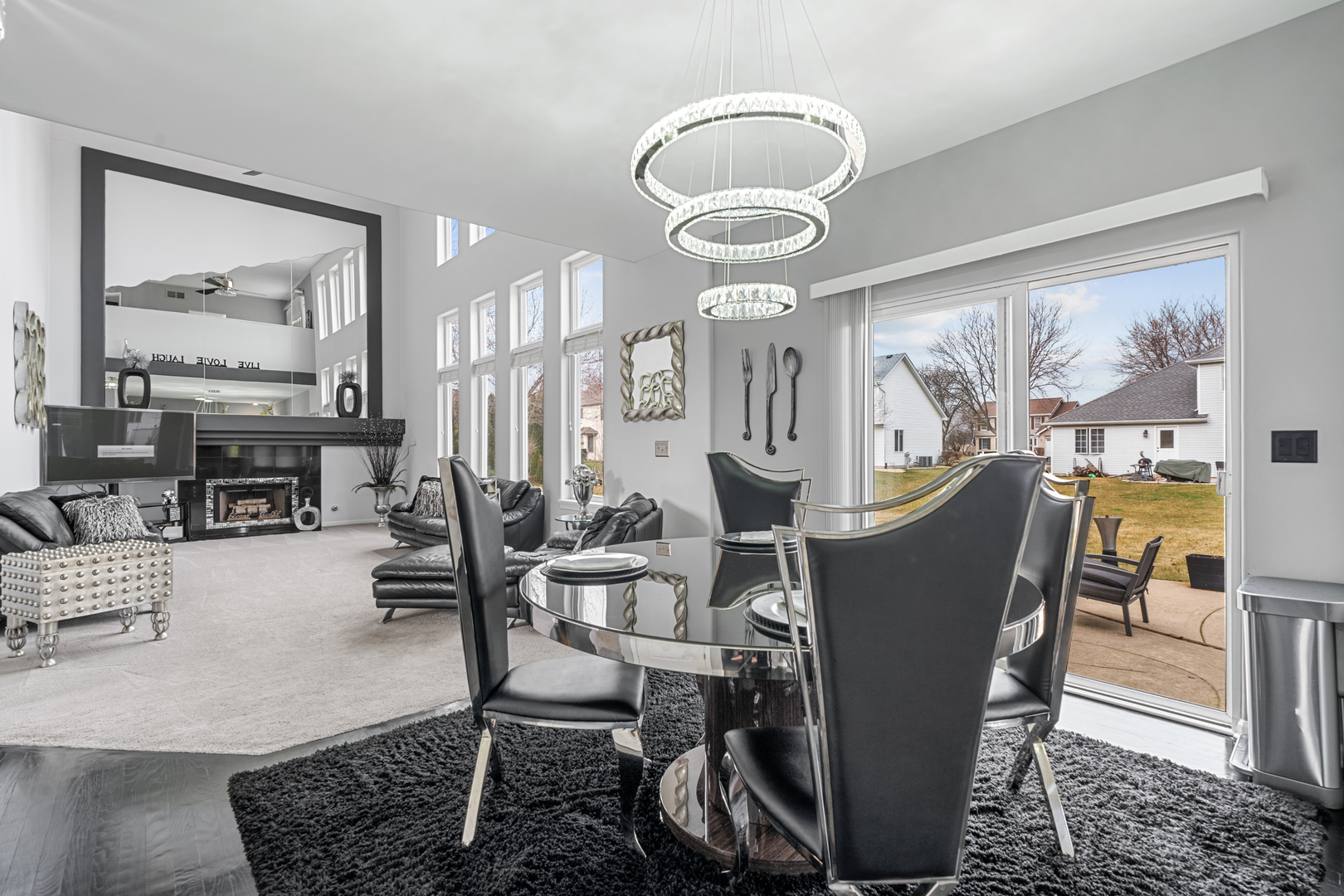 24962 Ambrose Road Plainfield, IL 60585 - Photo 9 of 28 a view of a dining room with furniture window and wooden floor