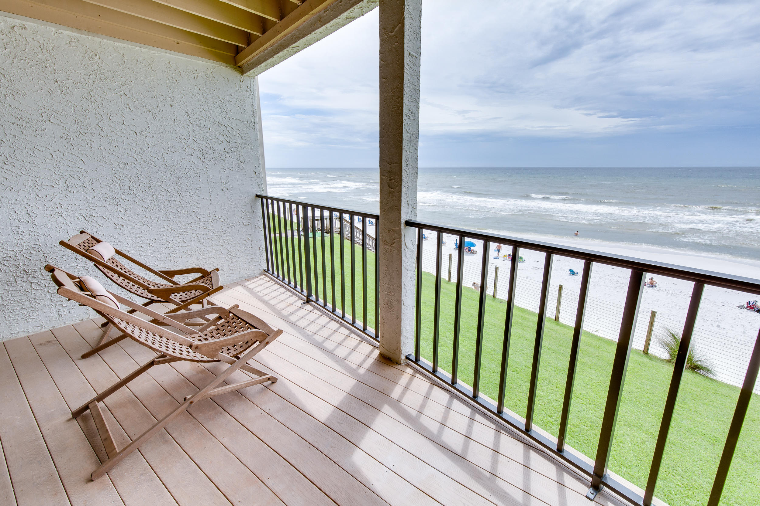 214 Blue Mountain Road, Unit 124 Santa Rosa Beach, FL 32459 - Photo 12 of 30 a view of a balcony with wooden floor