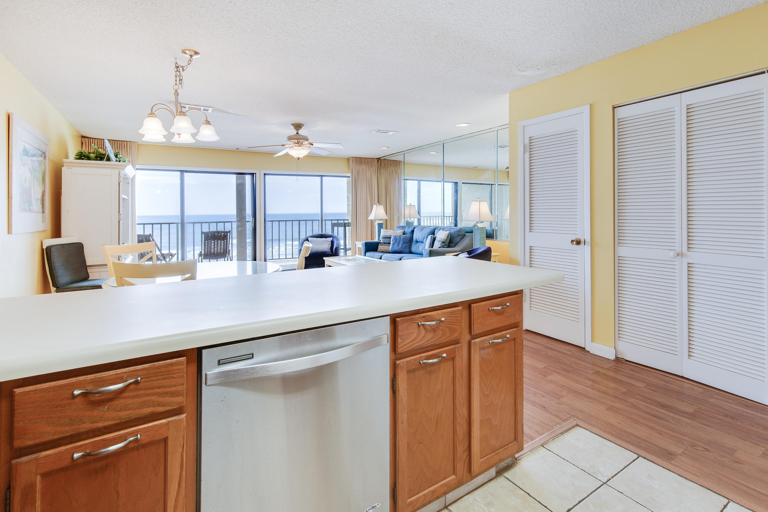 214 Blue Mountain Road, Unit 124 Santa Rosa Beach, FL 32459 - Photo 15 of 30 a kitchen with stainless steel appliances a sink stove and cabinets