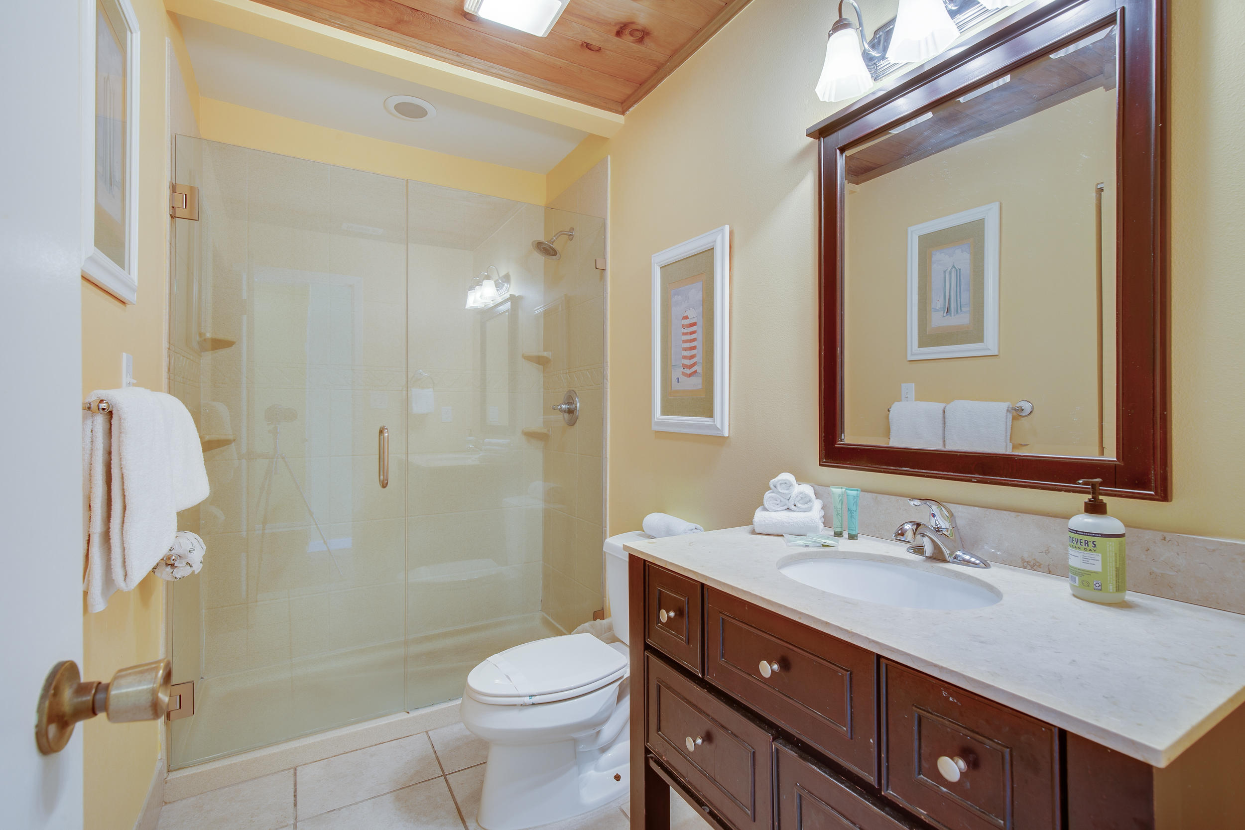 214 Blue Mountain Road, Unit 124 Santa Rosa Beach, FL 32459 - Photo 18 of 30 a bathroom with a sink a toilet and shower