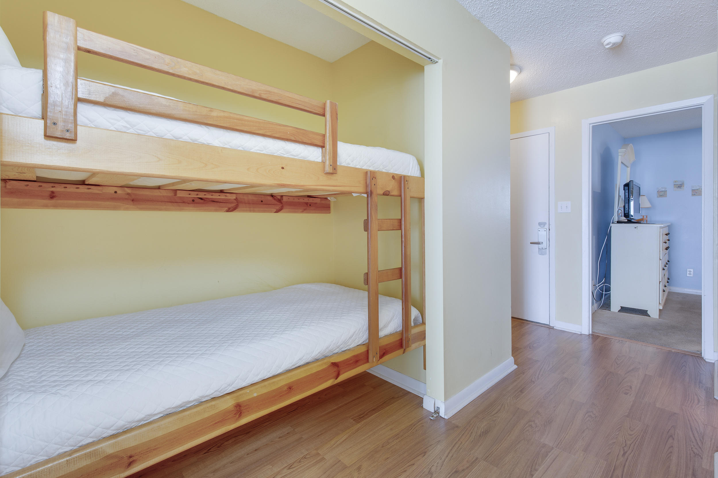 214 Blue Mountain Road, Unit 124 Santa Rosa Beach, FL 32459 - Photo 19 of 30 a view of a room with wooden floor