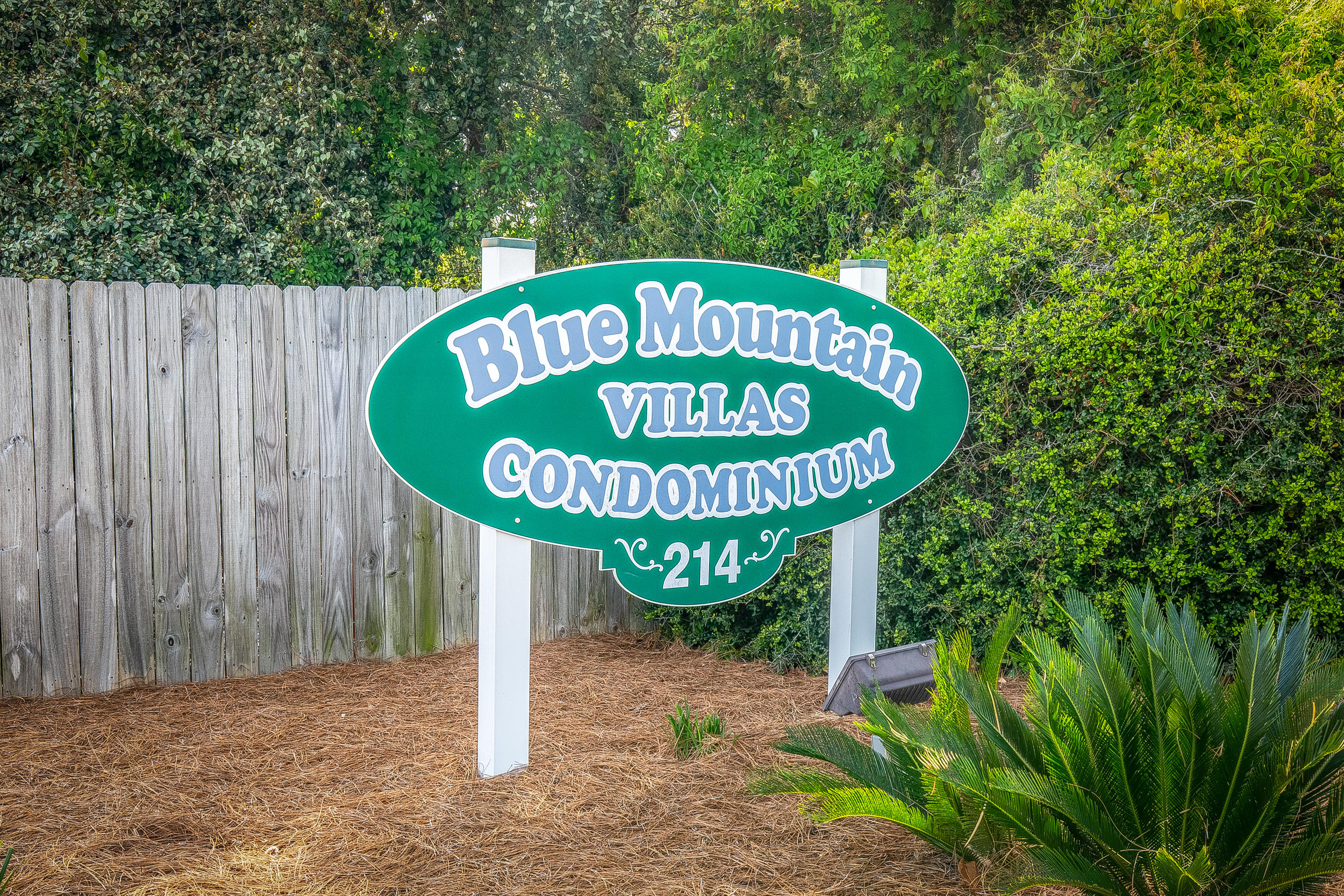 214 Blue Mountain Road, Unit 124 Santa Rosa Beach, FL 32459 - Photo 21 of 30 a sign on the side of the road