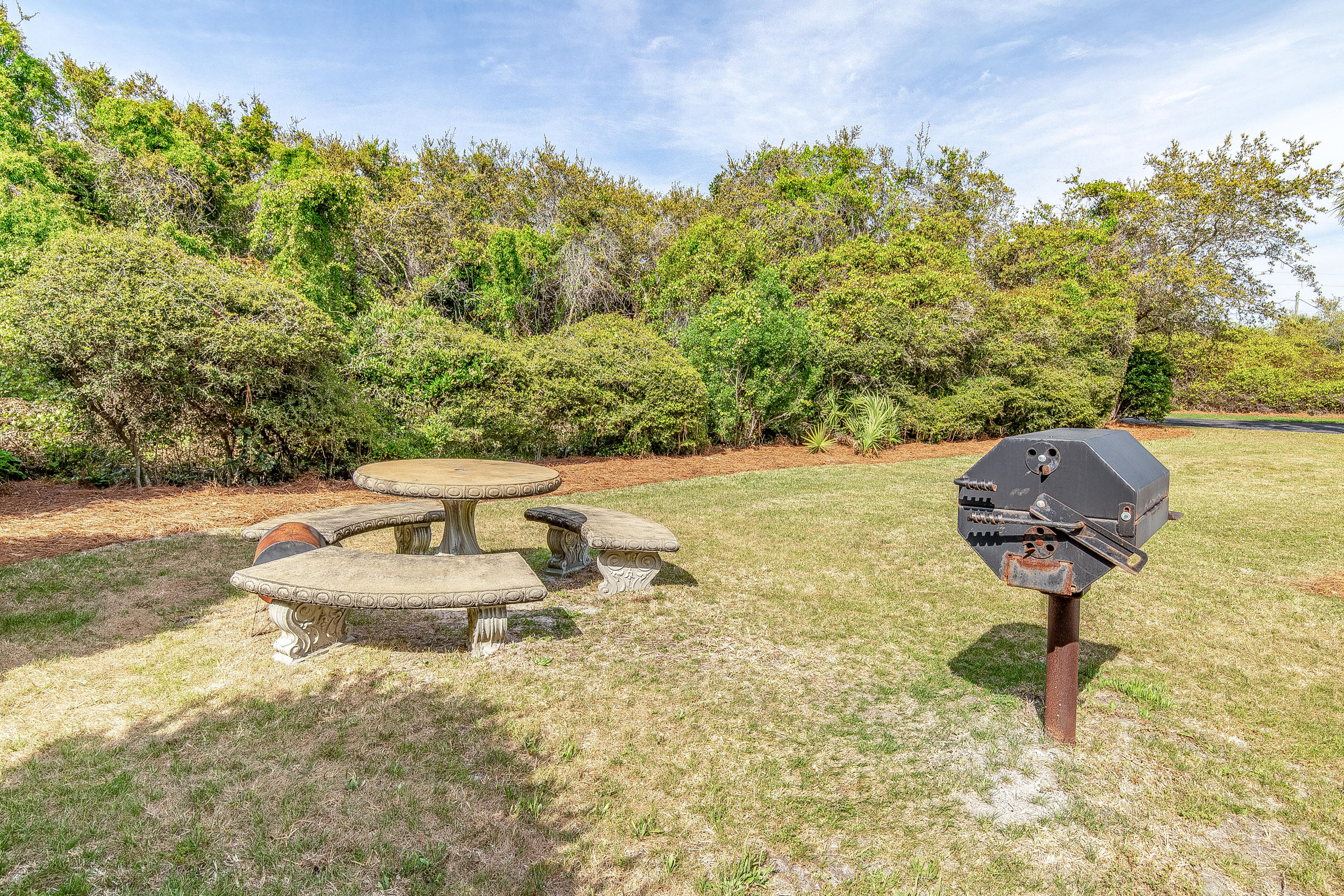 214 Blue Mountain Road, Unit 124 Santa Rosa Beach, FL 32459 - Photo 22 of 30 a view of a swimming pool with a yard