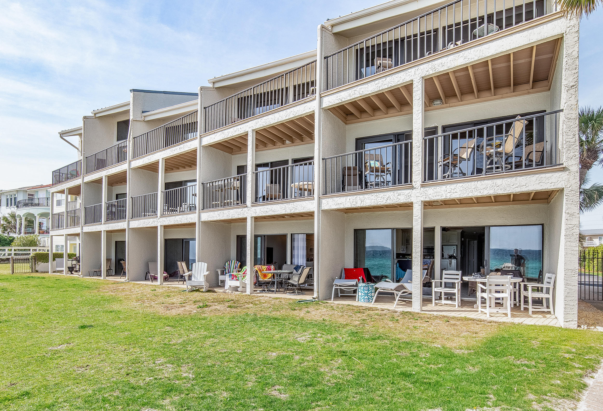 214 Blue Mountain Road, Unit 124 Santa Rosa Beach, FL 32459 - Photo 24 of 30 a front view of outdoor space with swimming pool and furniture