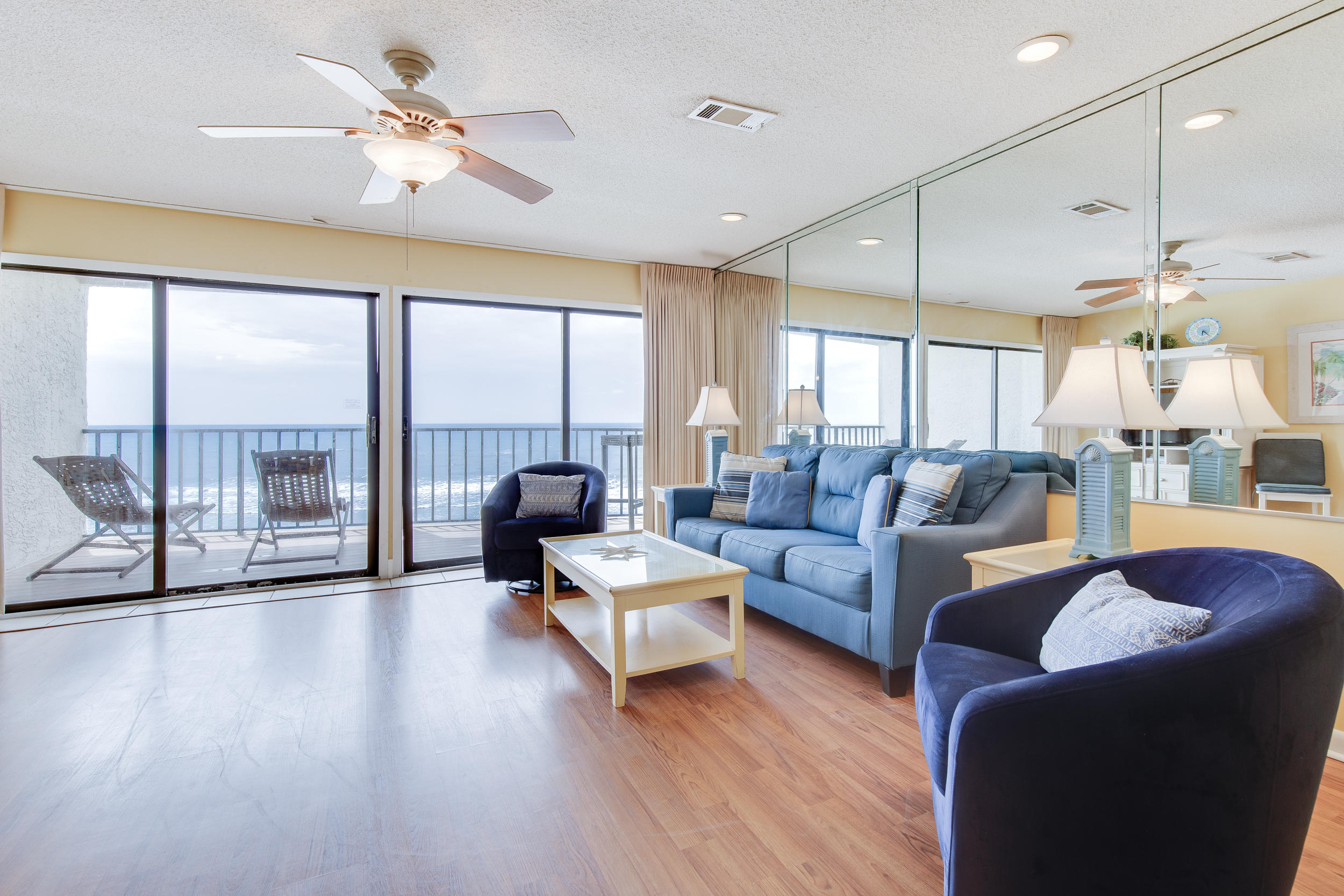 214 Blue Mountain Road, Unit 124 Santa Rosa Beach, FL 32459 - Photo 7 of 30 a living room with furniture or outdoor view and a large window