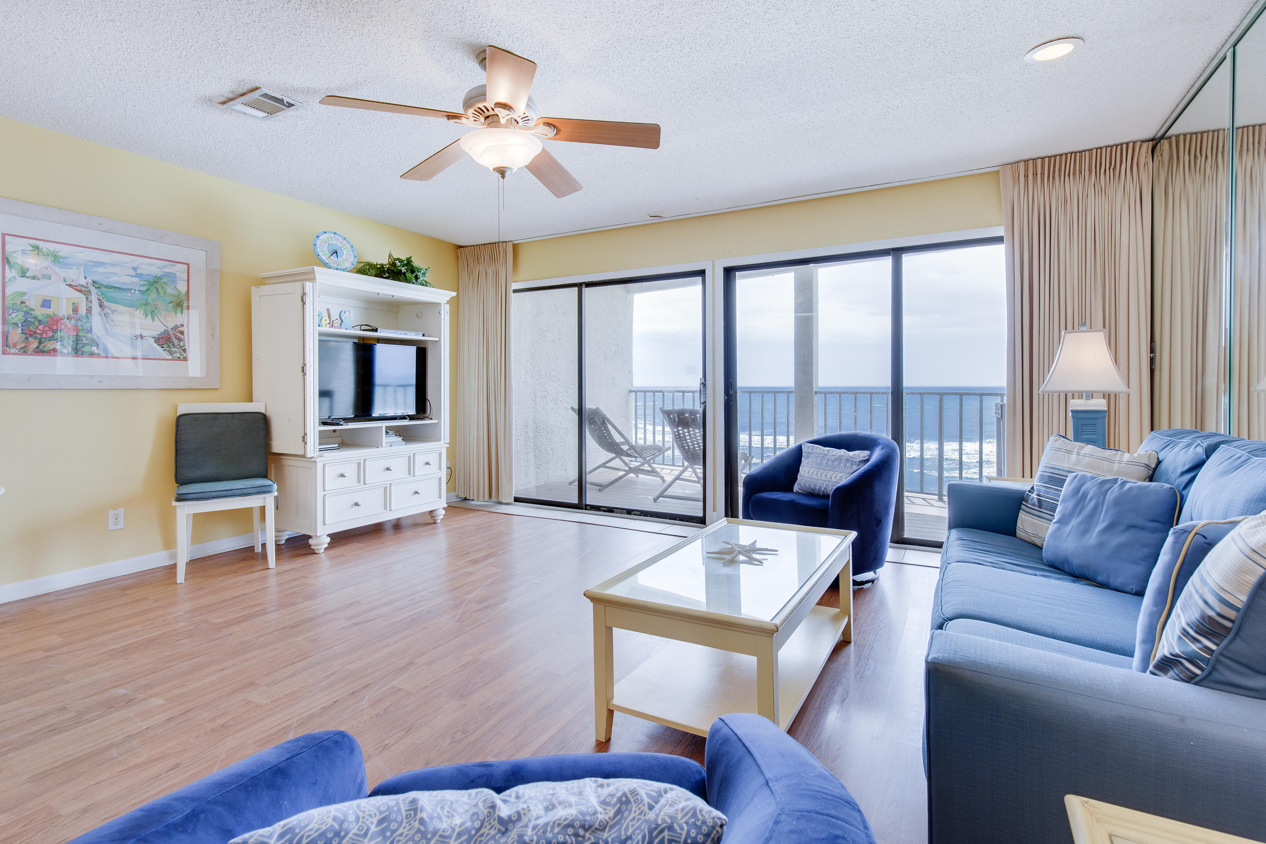 214 Blue Mountain Road, Unit 124 Santa Rosa Beach, FL 32459 - Photo 8 of 30 a living room with furniture and a floor to ceiling window