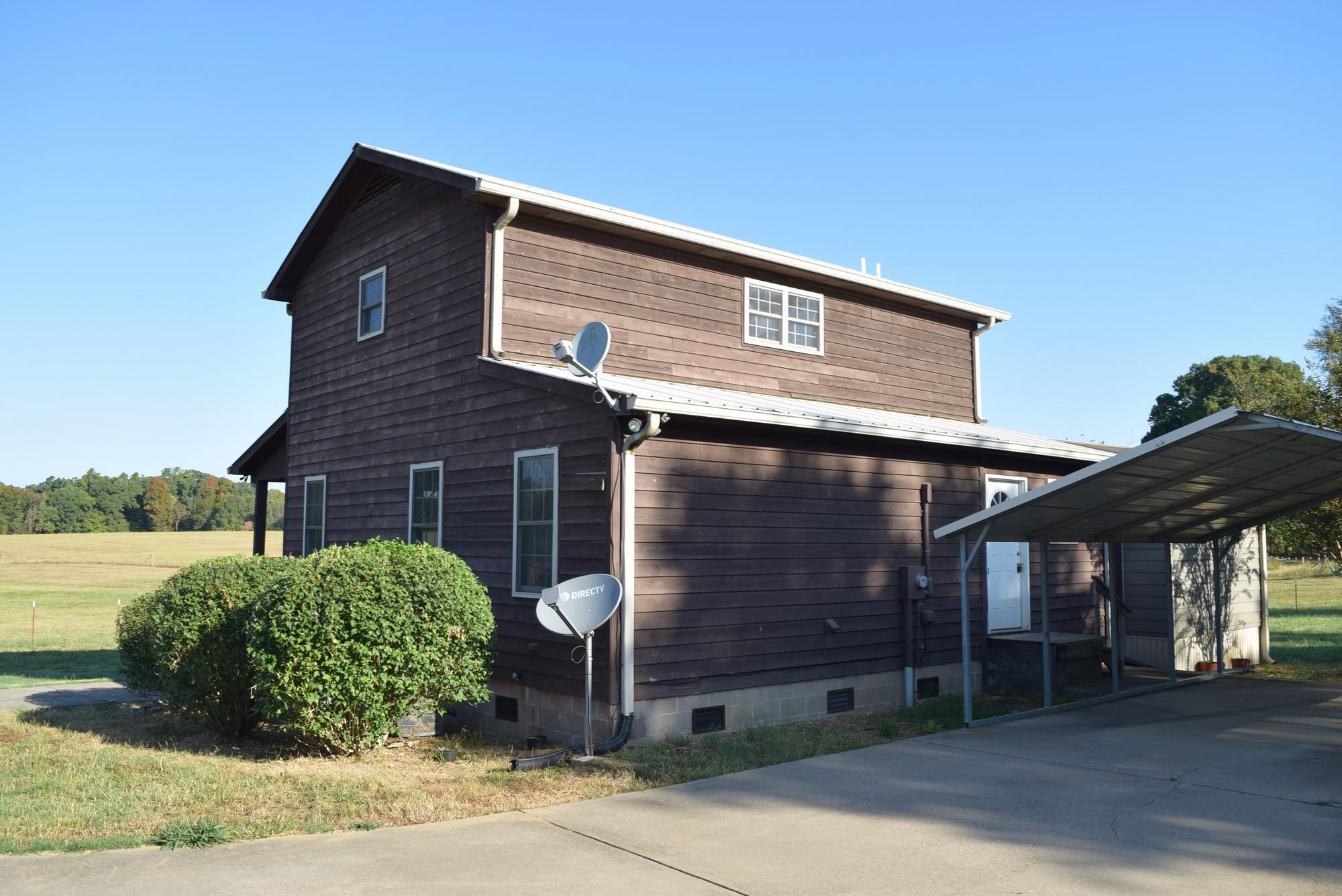 606 Cooley Ford Road Tennessee Ridge, TN 37178 - Photo 4 of 27 Back view with covered parking