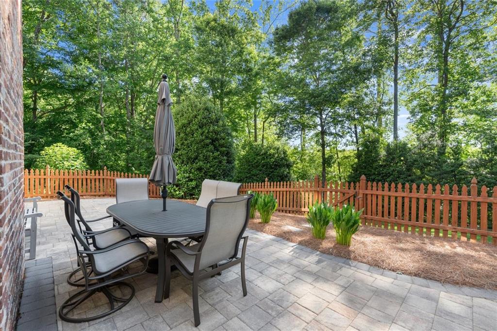 1450 Acworth Due West Road Northwest Kennesaw, GA 30152 - Photo 61 of 77 a view of backyard with a patio and wooden fence