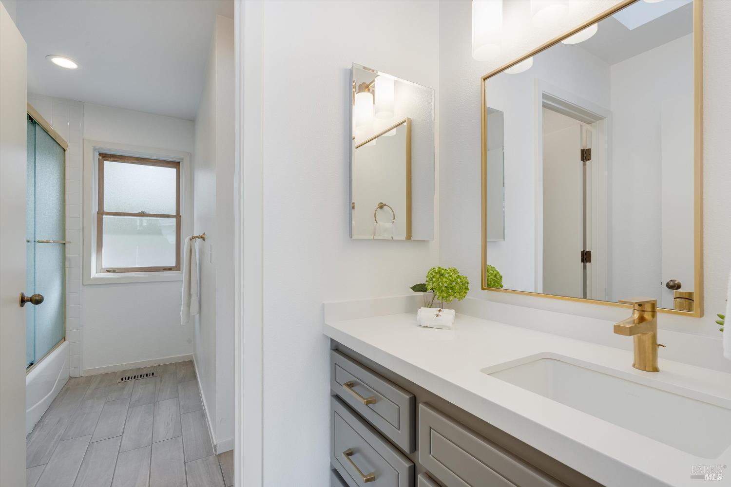 1777 Adams Street St. Helena, CA 94574 - Photo 22 of 31 a bathroom with a sink and a mirror
