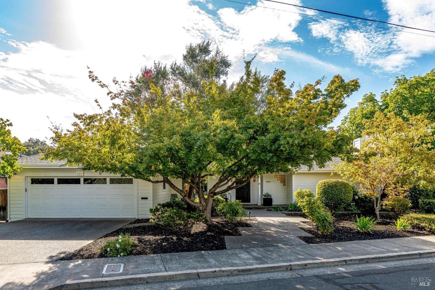 1777 Adams Street St. Helena, CA 94574 - Photo 31 of 31 a front view of a house with a yard and garage