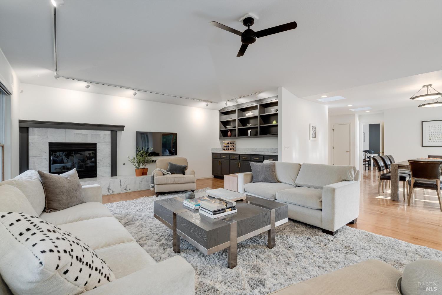 1777 Adams Street St. Helena, CA 94574 - Photo 10 of 31 a living room with furniture and a fireplace