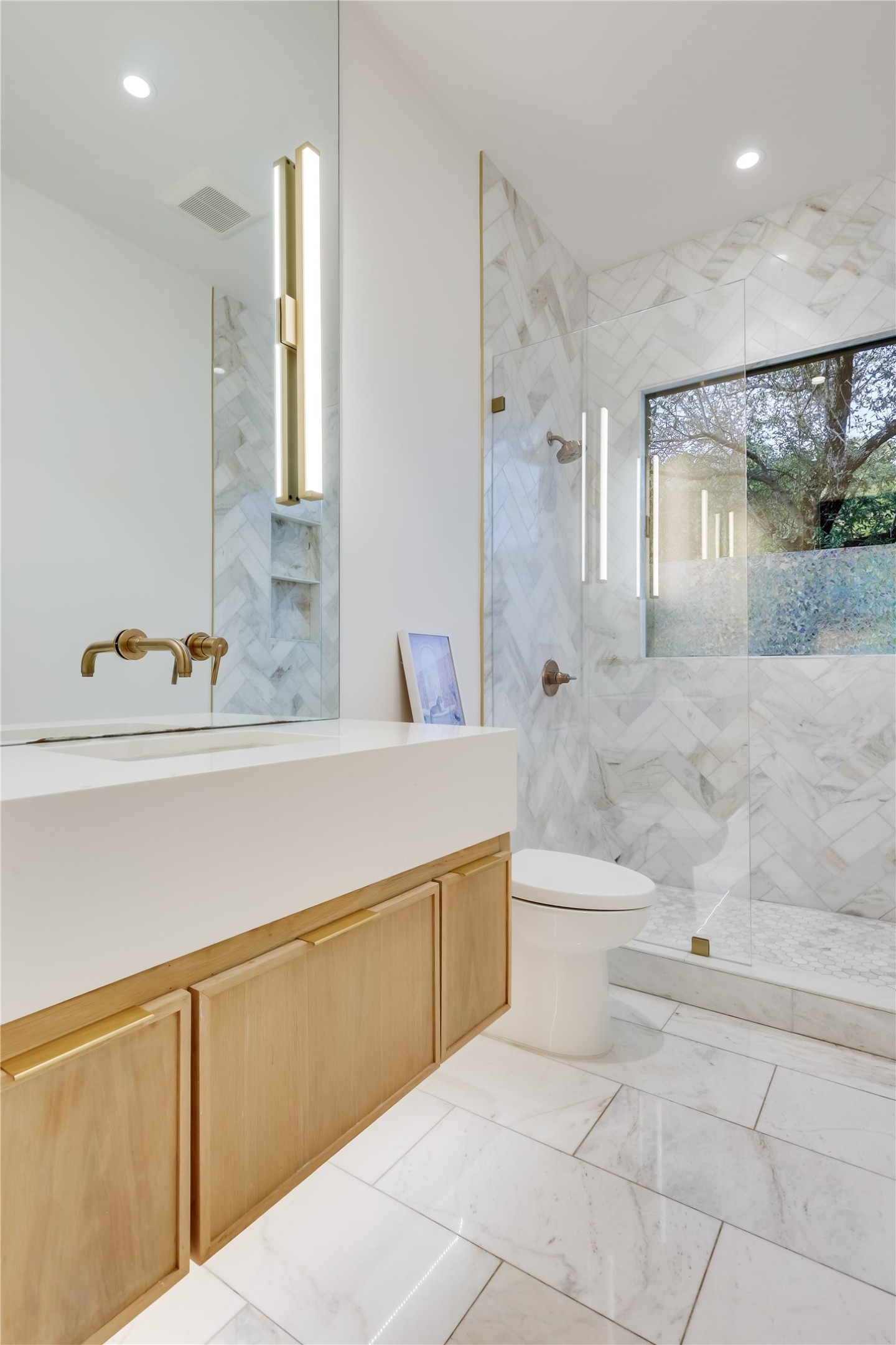 1016 Wild Basin Ledge Austin, TX 78746 - Photo 20 of 38 Full bathroom with vanity, a marble finish shower, and recessed lighting