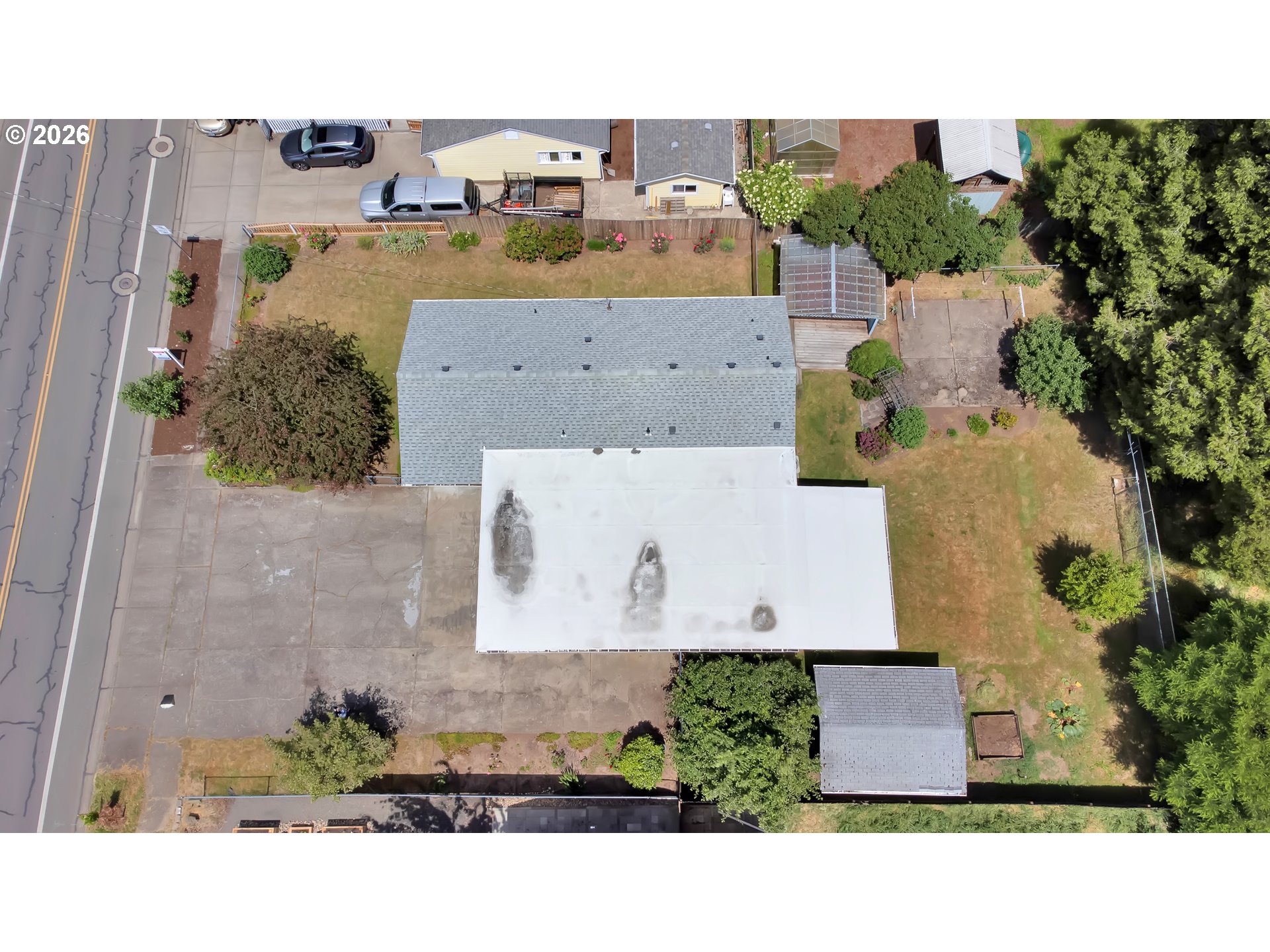 1425 Taney Street Eugene, OR 97402 - Photo 3 of 34 an aerial view of residential houses with outdoor space and parking