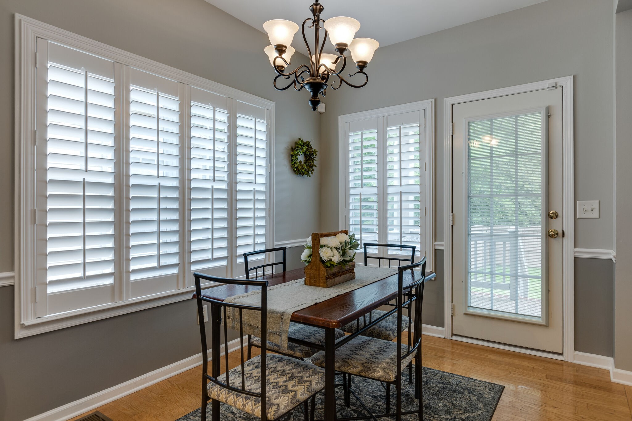 3133 Brimstead Drive Franklin, TN 37064 - Photo 13 of 32 a dining room with chandelier and wooden floor