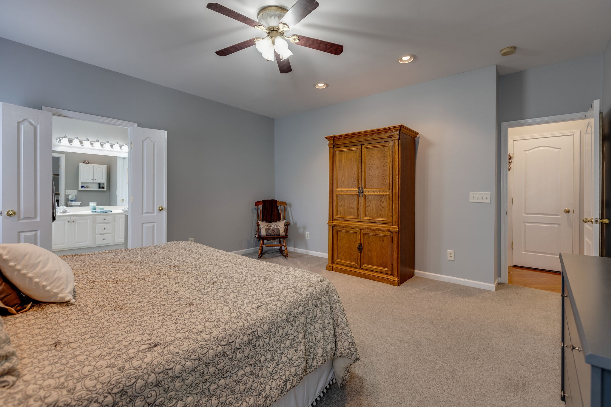 3133 Brimstead Drive Franklin, TN 37064 - Photo 20 of 32 a bedroom with a bed and a chandelier