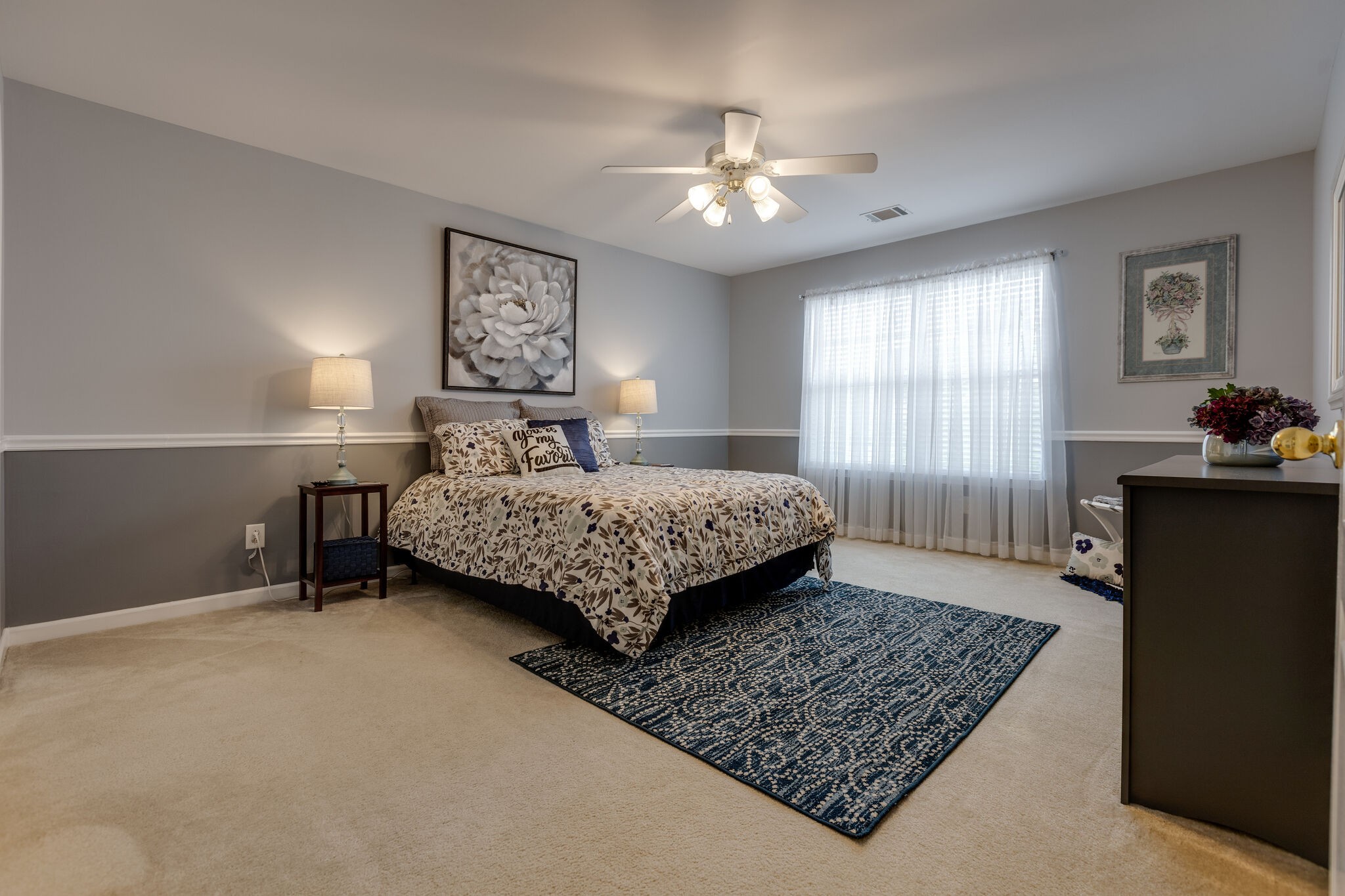 3133 Brimstead Drive Franklin, TN 37064 - Photo 23 of 32 a bedroom with a bed and a chandelier