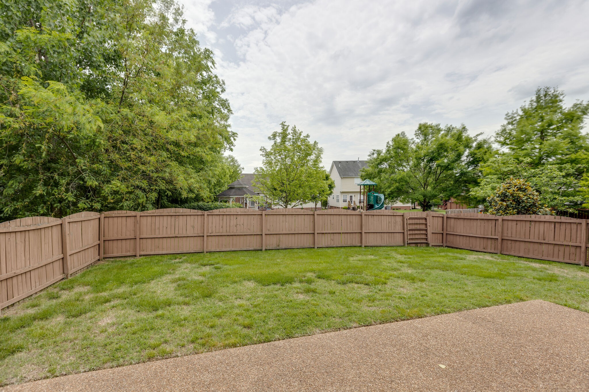 3133 Brimstead Drive Franklin, TN 37064 - Photo 29 of 32 a view of a backyard with a small cabin