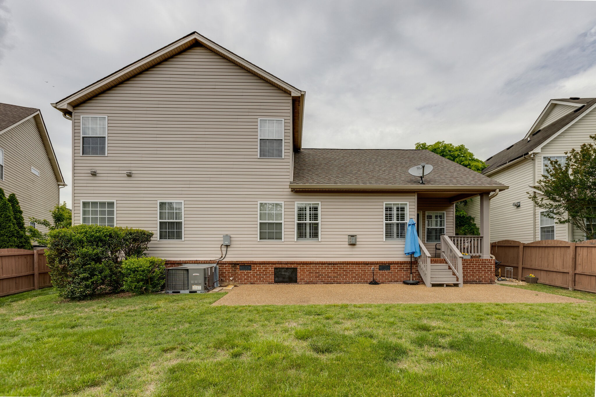 3133 Brimstead Drive Franklin, TN 37064 - Photo 30 of 32 a front view of house with yard and trees in the background