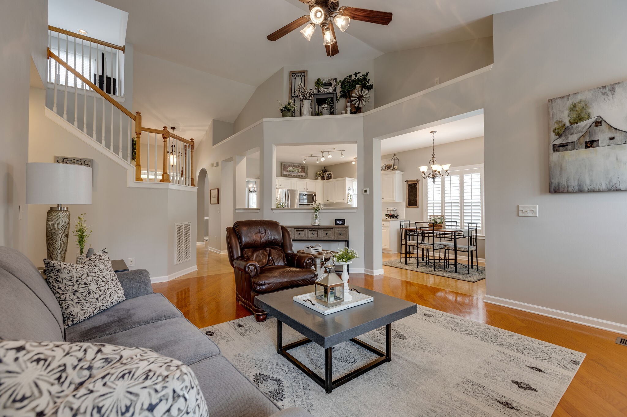 3133 Brimstead Drive Franklin, TN 37064 - Photo 10 of 32 a living room with furniture and a chandelier