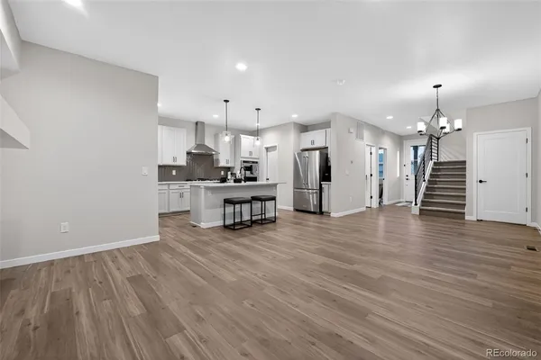 a view of a kitchen with a sink and a kitchen