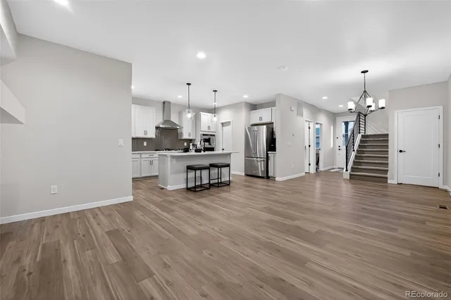 a view of a kitchen with a sink and a kitchen