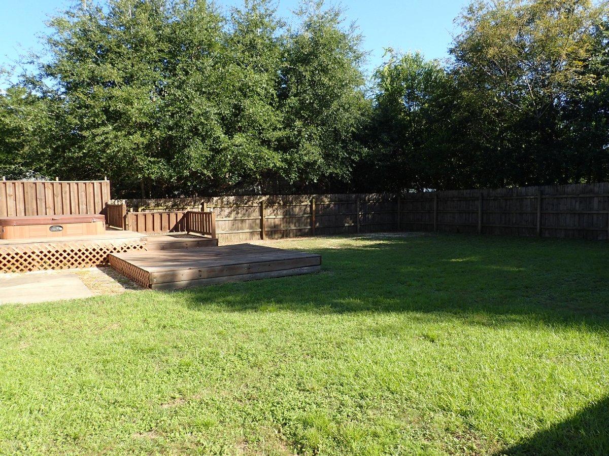 134 Hampton Drive Crestview, FL 32539 - Photo 15 of 17 a view of a patio with a yard