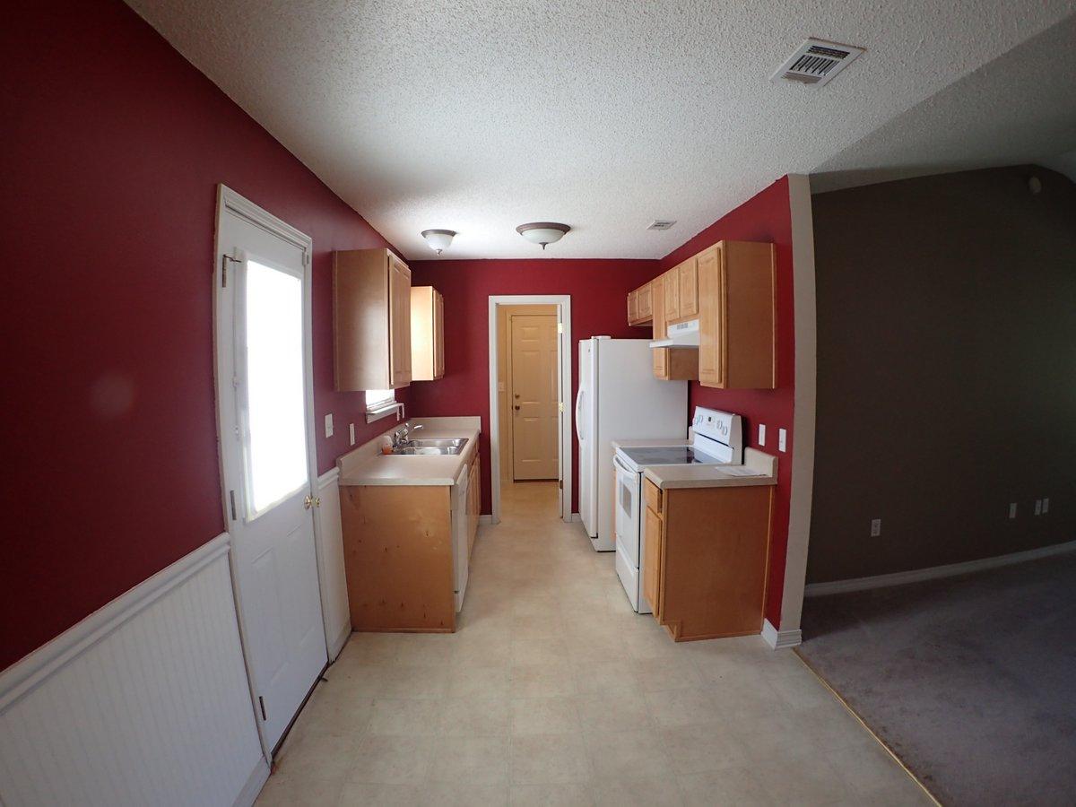 134 Hampton Drive Crestview, FL 32539 - Photo 5 of 17 a room with furniture and a window