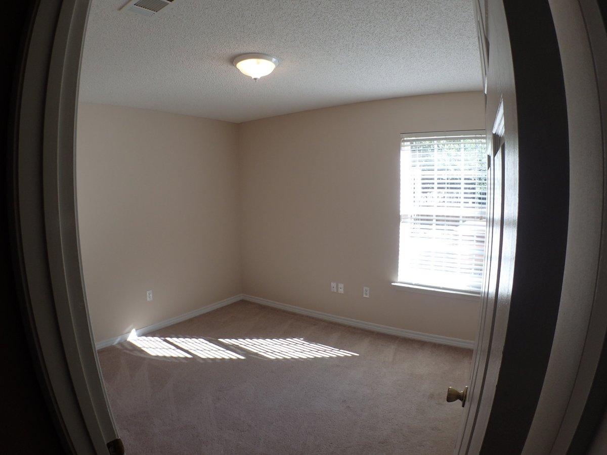 134 Hampton Drive Crestview, FL 32539 - Photo 9 of 17 a view of empty room with window