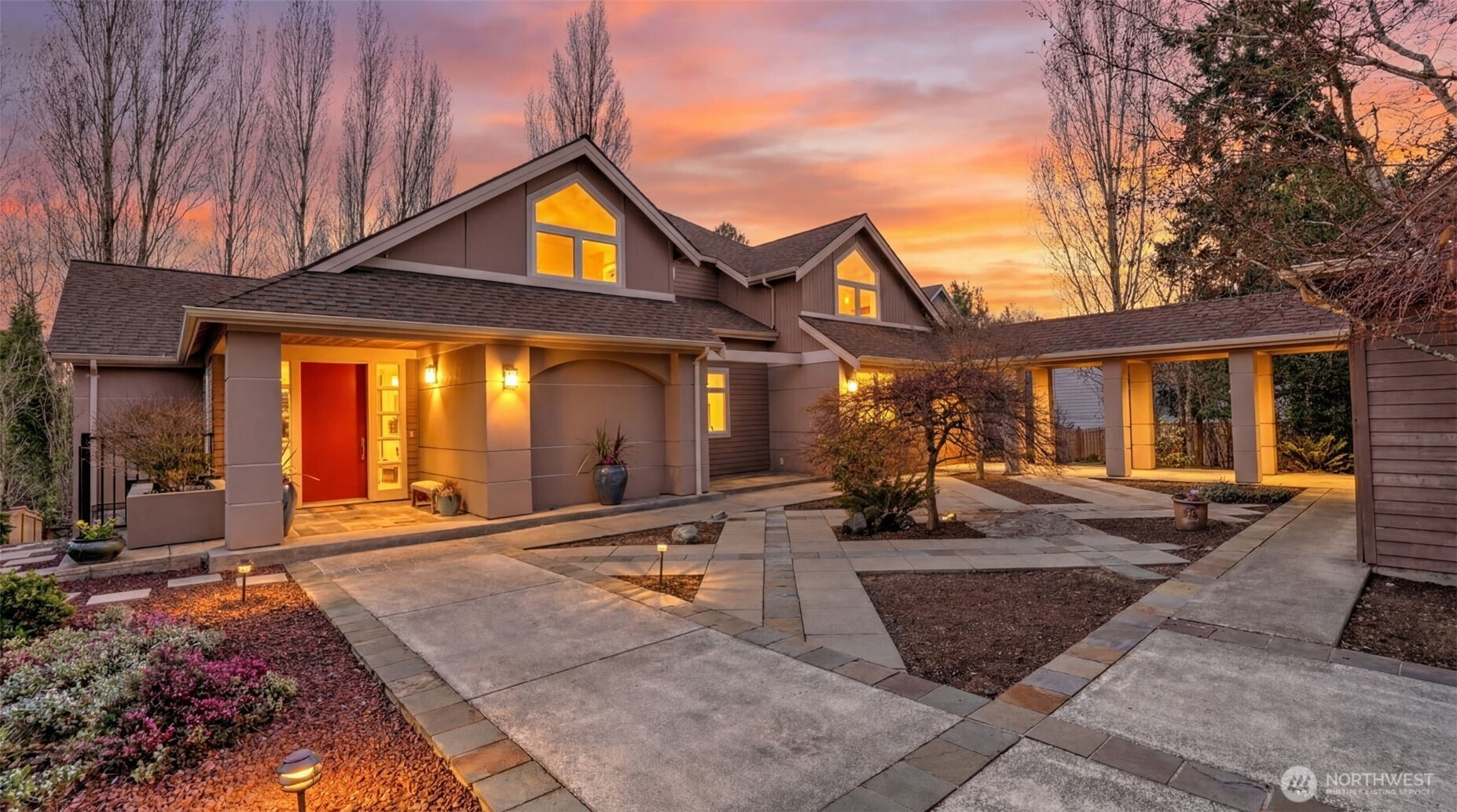 a front view of house with outdoor seating