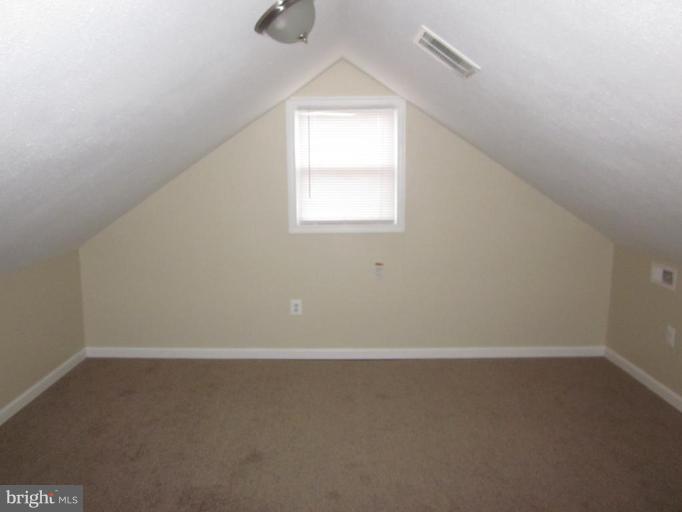 1120 North Point Road Dundalk, MD 21222 - Photo 14 of 14 an empty room with a window