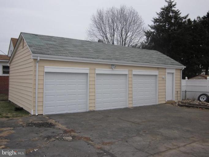 1120 North Point Road Dundalk, MD 21222 - Photo 10 of 14 a view of garage and yard