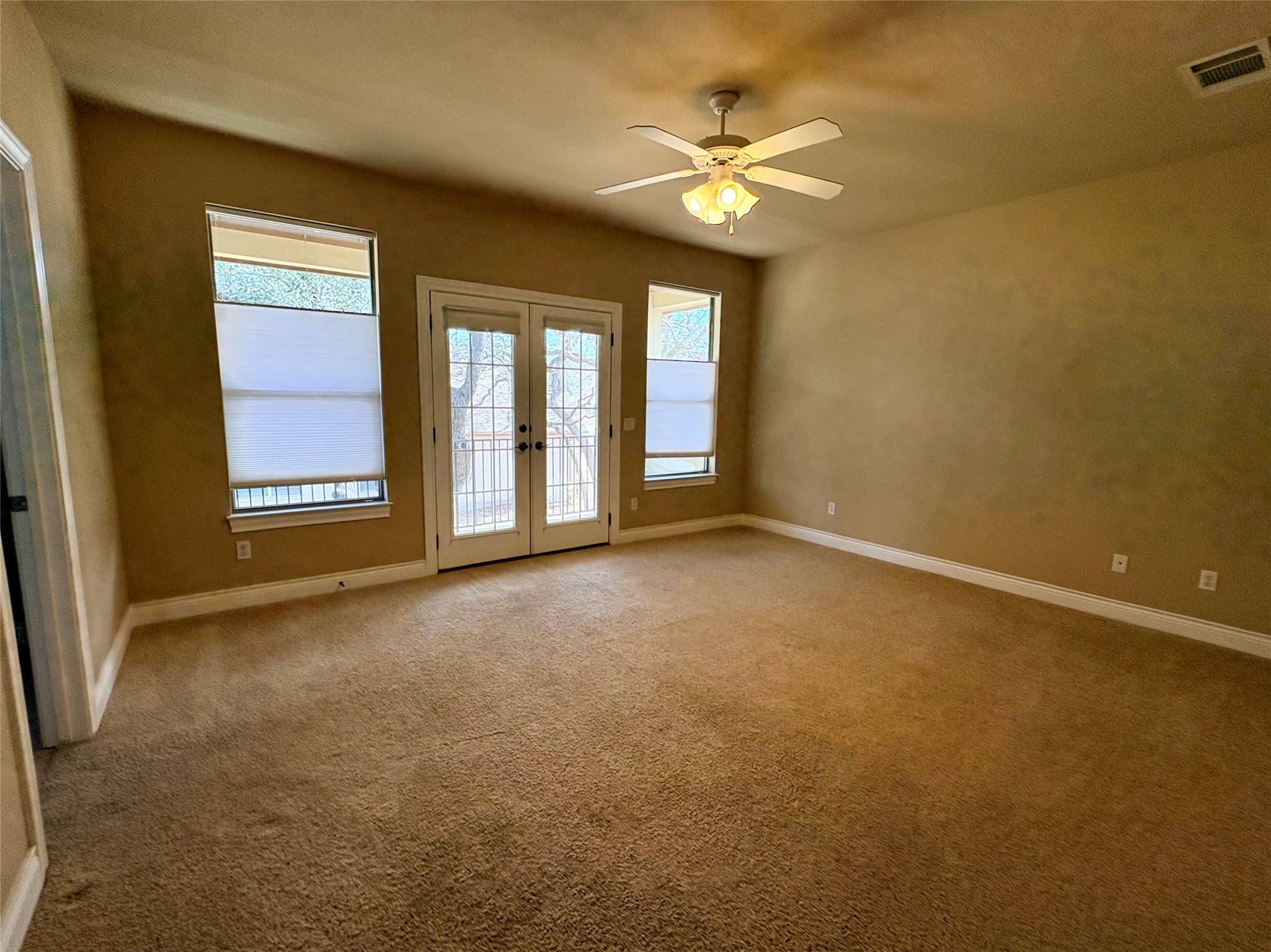 4802 Hidden Springs Trail Georgetown, TX 78633 - Photo 23 of 33 Bedroom #3 upstairs with walk-out balcony.