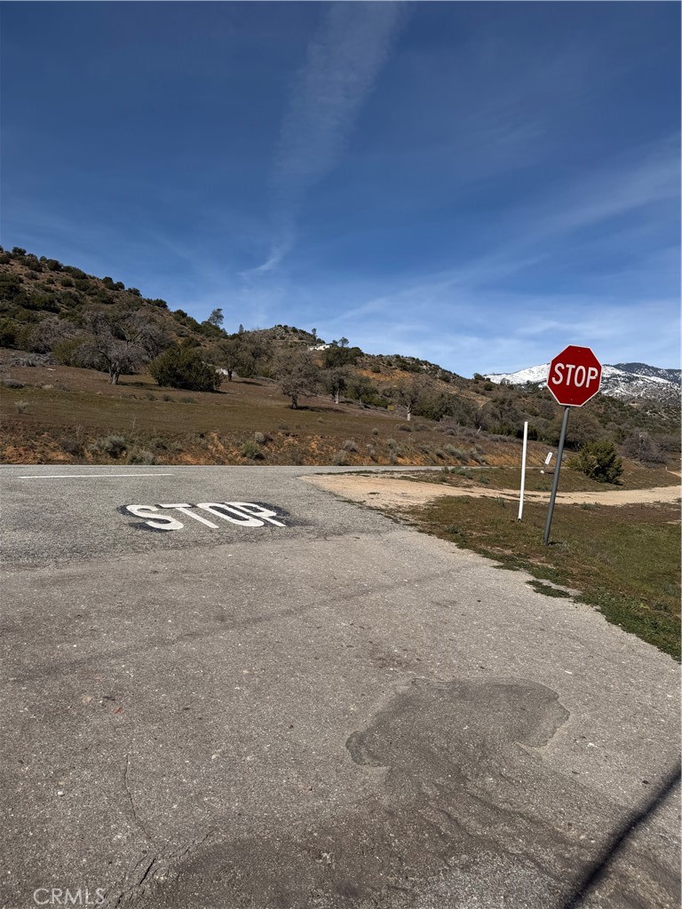 0 Sand Canyon Road Caliente, CA 93518 - Photo 2 of 13 a view of a street with a barn in the background