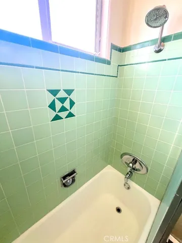 a living room with a rug