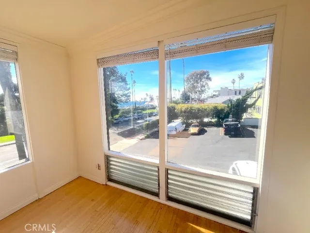 a view of a glass door with a balcony