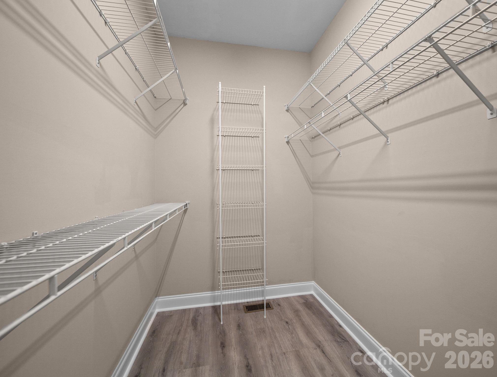 715 Witmore Road Wingate, NC 28174 - Photo 18 of 48 a view of a room with racks on the wall