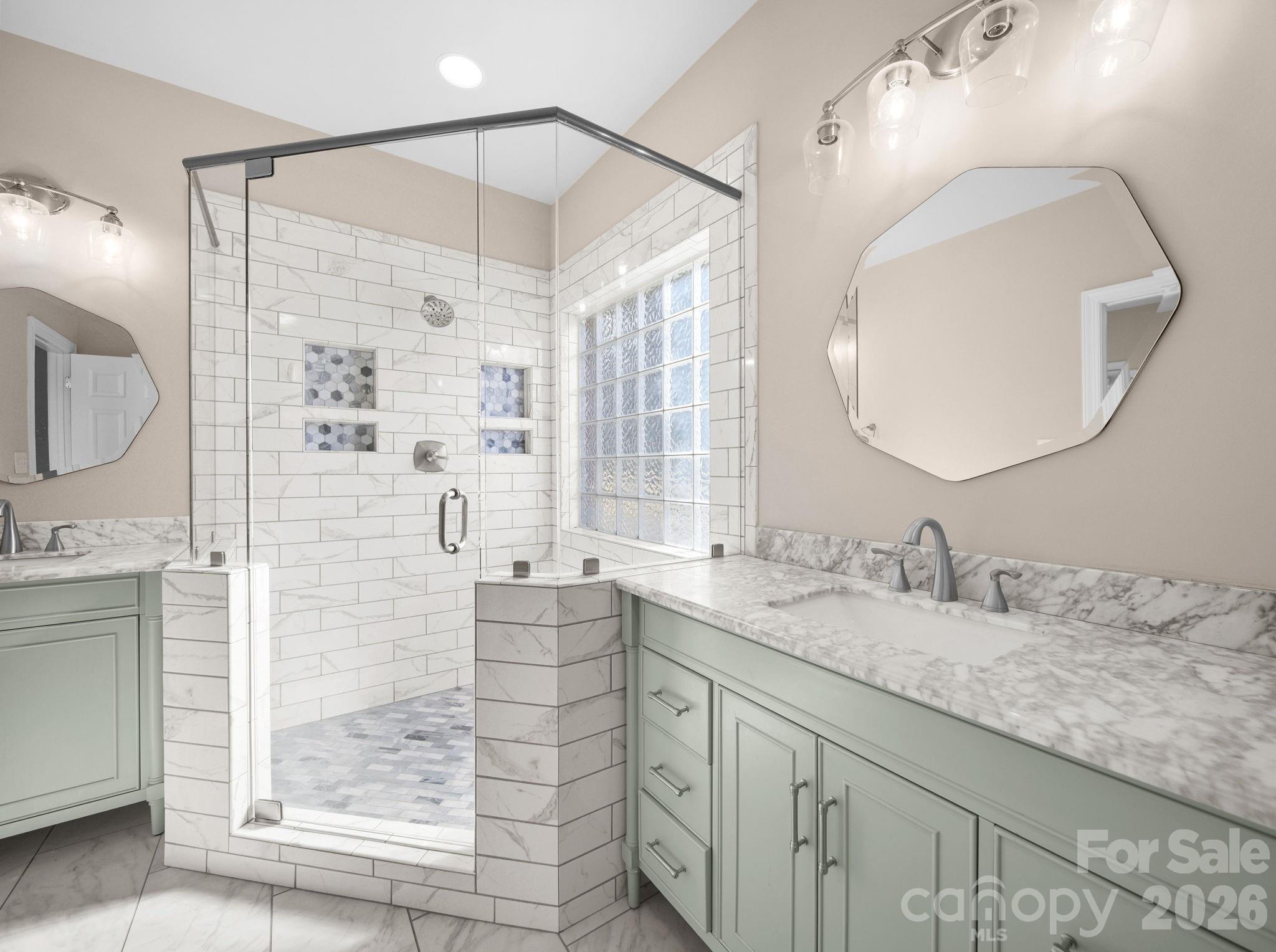 715 Witmore Road Wingate, NC 28174 - Photo 20 of 48 a bathroom with a granite countertop sink mirror and shower